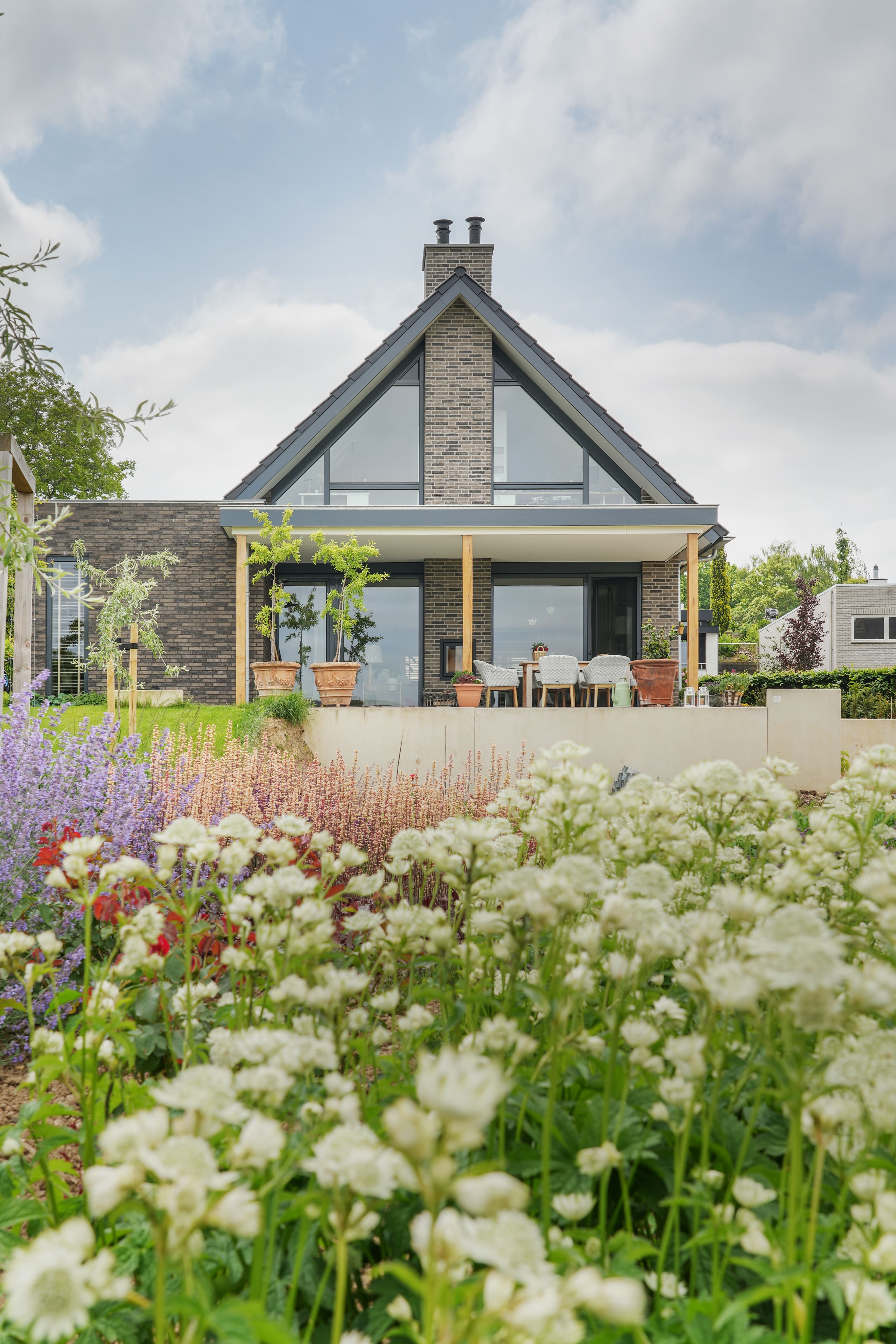 Schuurwoning met bloemrijke achtertuin