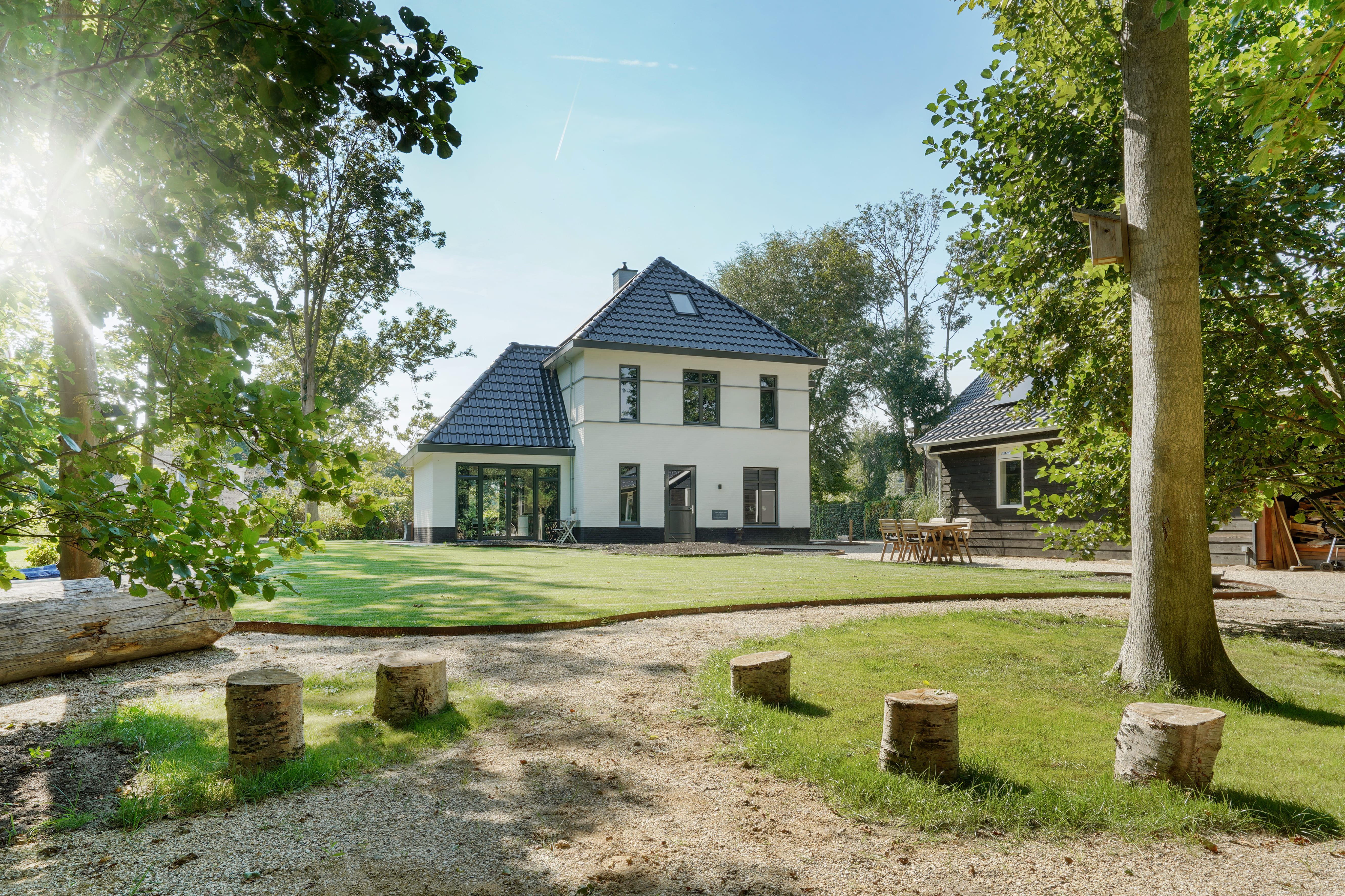 Herenhuis in een bosrijke omgeving