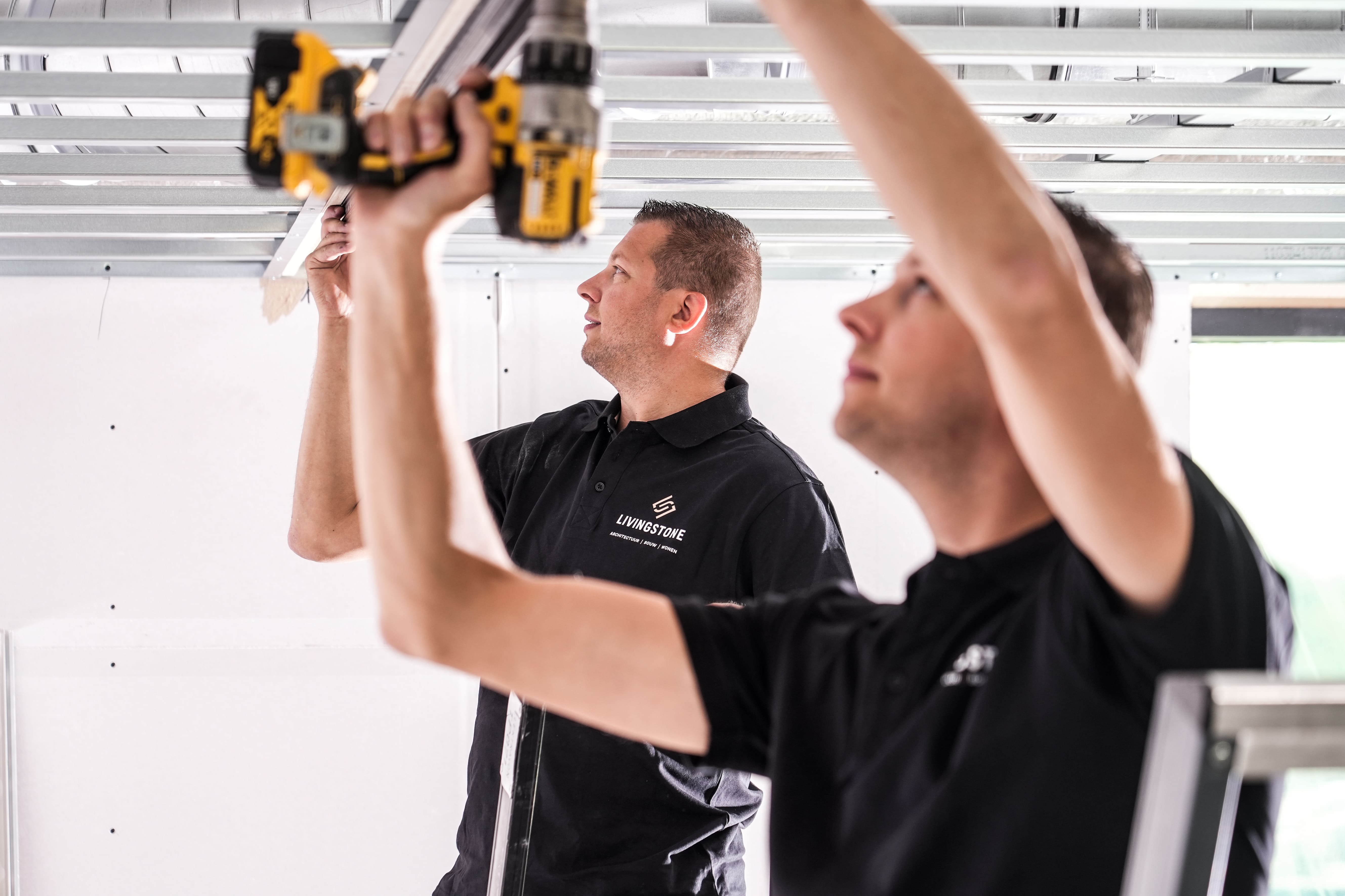 Uitvoerders van livingstone bouwteam aan het werk